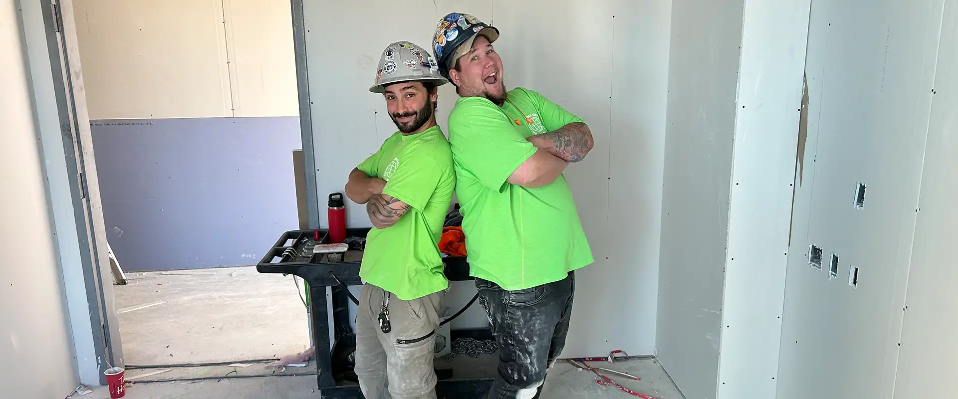 friendly SPAN workers posing back to back