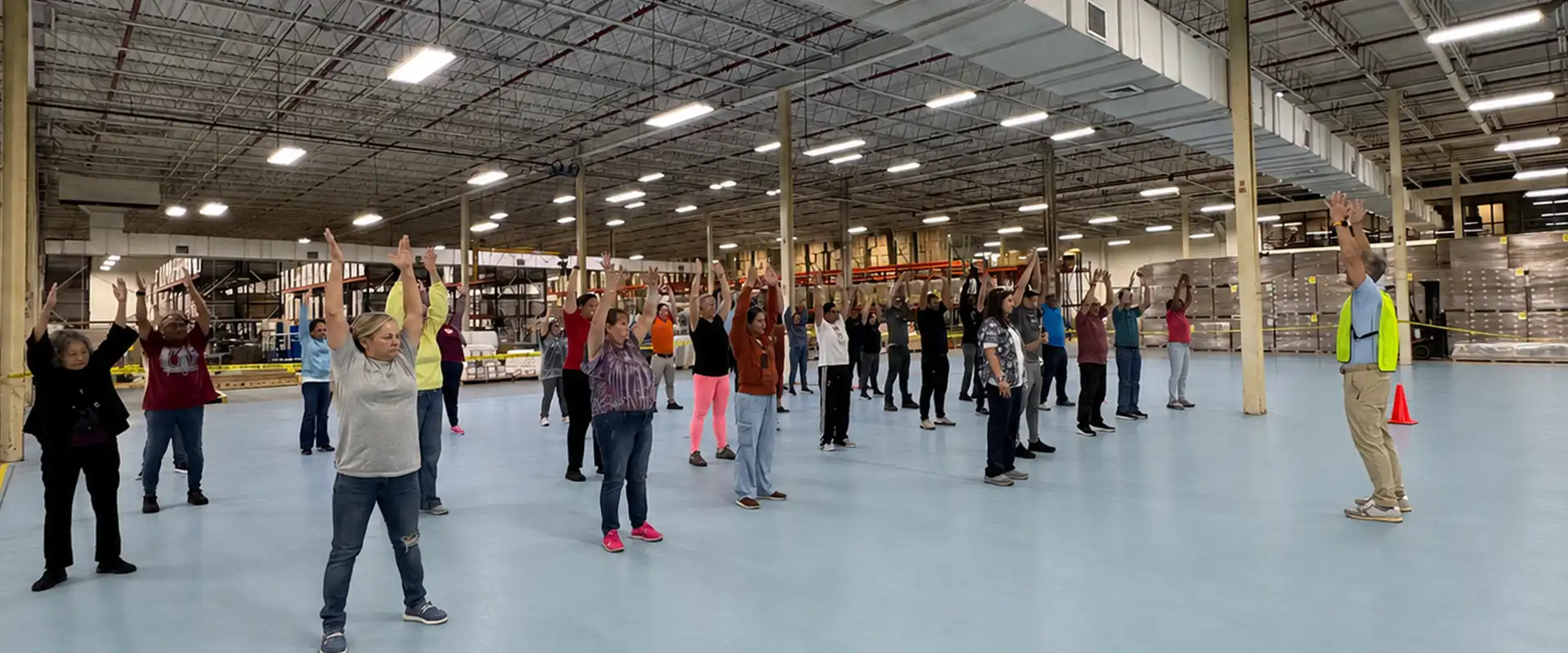 SPAN facility doing group stretches