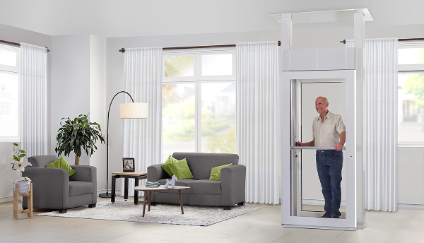 happy elderly man using his Luma shaftless home lift