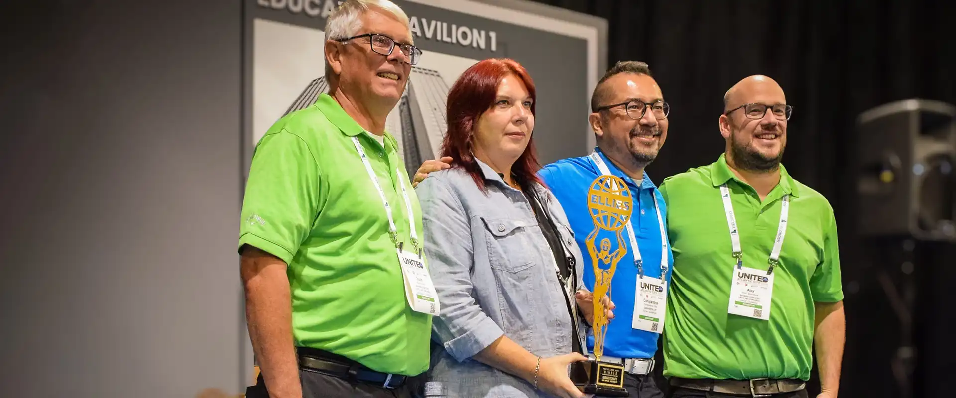 Savaria and Garaventa team accepting Ellies award at NAEC